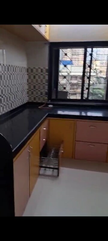 Kitchen in 1 BHK Apartment at Excellency CHS, Andheri West – for Rent