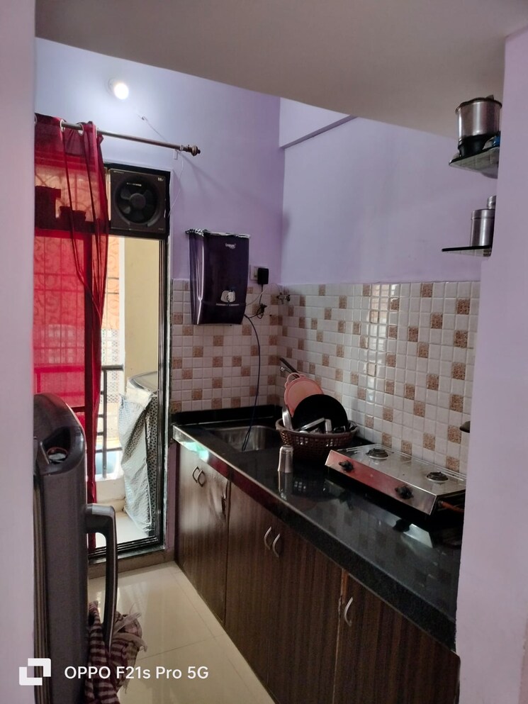 Kitchen, nere 1 Bedroom 650 Sq.Ft. Apartment In Nere Navi Mumbai 7902634