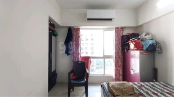 Living Room in 1 BHK Apartment at Lodha Amara, Kolshet Road – for Sale