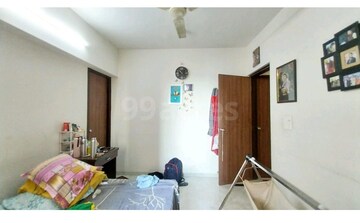 Living Room in 1 BHK Apartment at Lodha Amara, Kolshet Road – for Sale