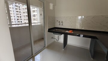 Kitchen in 3 BHK Apartment at Mantra Essence, Undri – for Sale