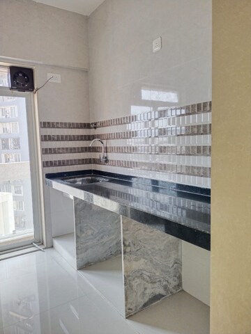 Kitchen in 4 BHK Builder Floor at Sector 25 – for Sale