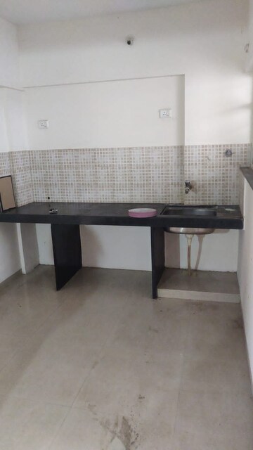Kitchen in 2 BHK Apartment at Jalan Aura County Pune, Wagholi – for Rent