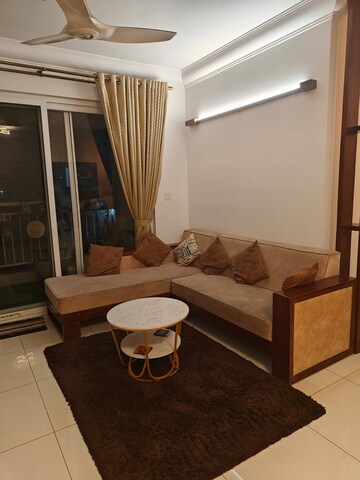 Living Room in 2 BHK Apartment at Puravankara Palm Beach, Hennur – for Rent