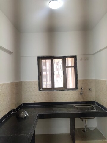 Kitchen in 1 BHK Apartment at Kumar Urban Kul Ecoloch, Mahalunge – for Rent