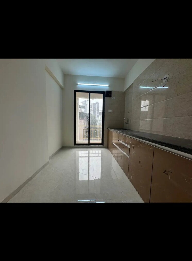 Kitchen, keni-city 1 Bedroom 680 Sq.Ft. Apartment In Pisarve Navi Mumbai 7903869
