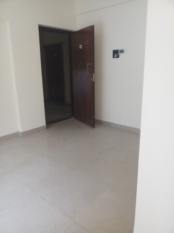Living Room in 2 BHK Apartment at Pranjee Garden City Phase 2, Katrap – for Sale
