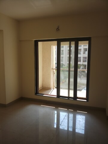 Room in 2 BHK Apartment at Pranjee Garden City Phase 2, Katrap – for Sale