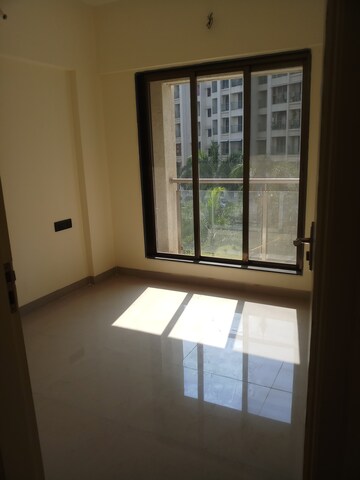 Bedroom in 2 BHK Apartment at Pranjee Garden City Phase 2, Katrap – for Sale