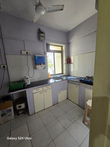 Kitchen in 2 BHK Apartment at Rising Sun Apartments Juhu, Juhu – for Rent