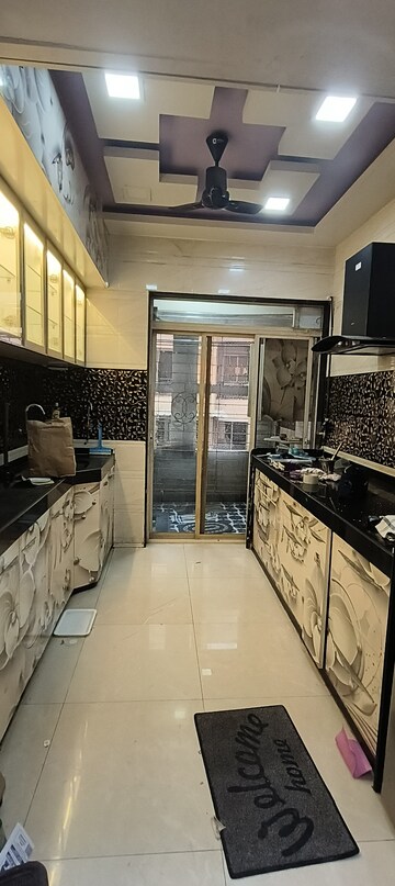 Kitchen in 2 BHK Apartment at Dweepmala Gauri Priya, Kharghar – for Rent