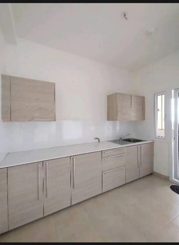 Kitchen in 2 BHK Apartment at Bhartiya Nikoo Homes, Thanisandra Main Road – for Sale