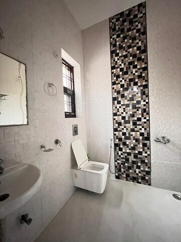 Bathroom in 2 BHK Apartment at Aims Golf Avenue II, Sector 75 – for Rent