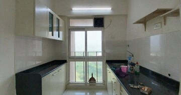 Kitchen in 1 BHK Apartment at Raunak Unnathi Woods Phase 7 A And B, Ghodbunder Road – for Rent
