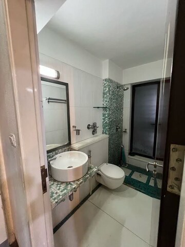 Bathroom in 2 BHK Apartment at Dynamix Shagun Mall Tower, Malad East – for Rent