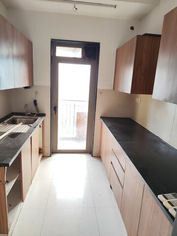 Kitchen in 2 BHK Apartment at Lodha Splendora, Ghodbunder Road – for Rent