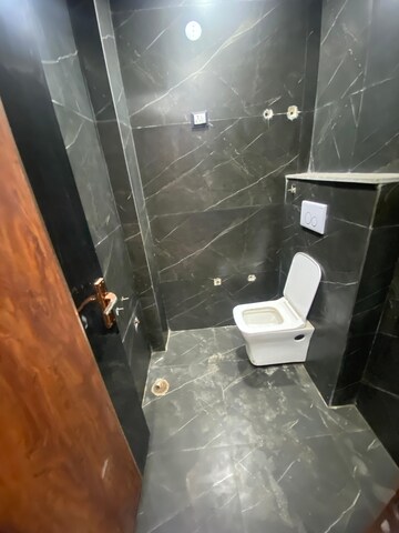 Bathroom in 2 BHK Builder Floor at Dwarka Mor – for Sale