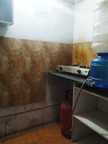 Kitchen in 1 RK Independent House at RWA Apartments, Sector 31 – for Rent