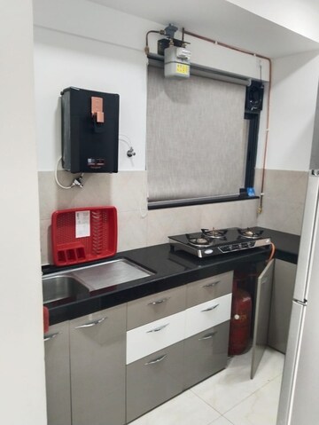 Kitchen in 2 BHK Apartment at Shapoorji Pallonji Epsilon, Kandivali East – for Rent