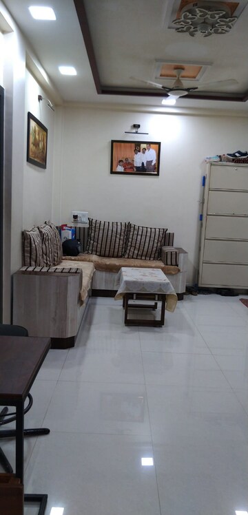 Living Room in 2 BHK Apartment at Muktai CHS, Sion – for Sale