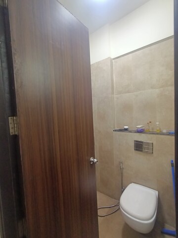 Bathroom in 3 BHK Apartment at Runwal Greens Pinewood, Mulund West – for Rent