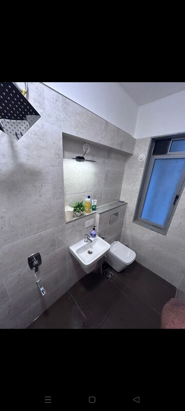 Bathroom in 2 BHK Apartment at Dynamix Avanya, Dahisar East – for Rent