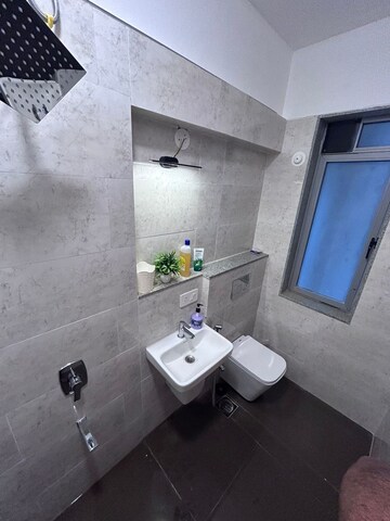 Bathroom in 2 BHK Apartment at Dynamix Avanya, Dahisar East – for Rent