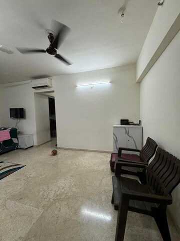 Living Room in 1.5 BHK Apartment at Lodha Splendora, Ghodbunder Road – for Sale