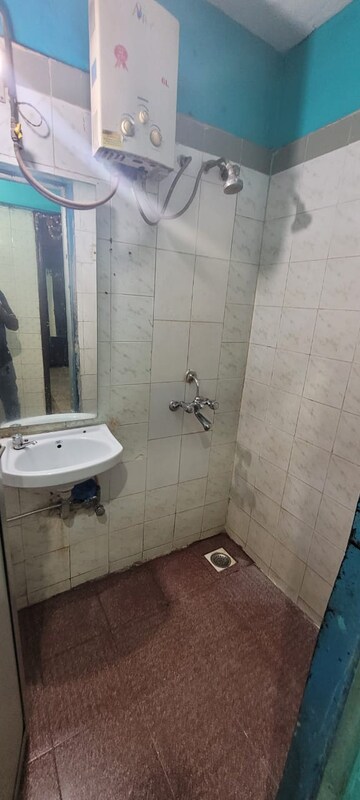 Bathroom in 1.5 BHK Apartment at Vasant Vihar – for Rent