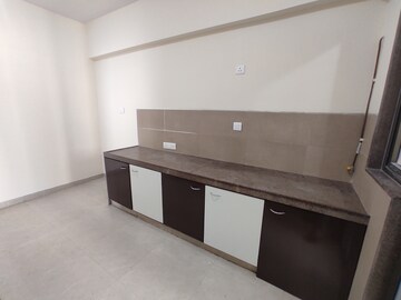 Kitchen in 3 BHK Apartment at Bhimjyani Verraton, Manpada – for Rent