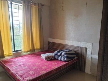 Bedroom in 2 BHK Apartment at Swastik Heights Mahalunge, Mahalunge – for Rent