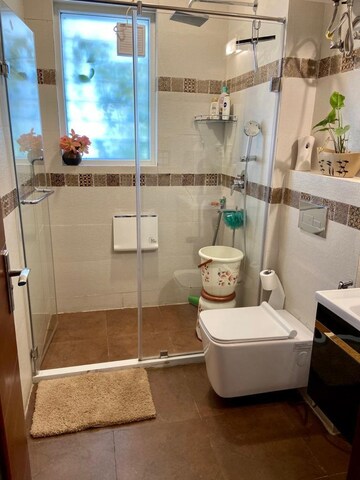 Bathroom in 4 BHK Builder Floor at Kohli One Malibu Town, Sector 47 – for Rent
