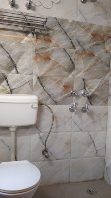Bathroom in 1 BHK Builder Floor at Ansal Sushant Lok I, Sector 43 – for Rent