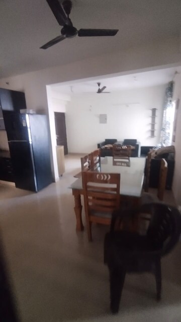 Living Room in 2.5 BHK Apartment at Aims Golf City, Sector 75 – for Rent
