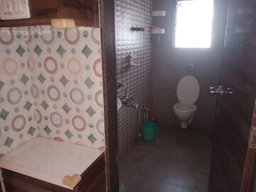 Bathroom in 2 BHK Apartment at Murbad Road – for Sale