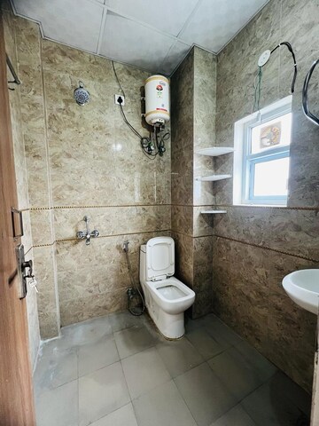 Bathroom in 1 RK Builder Floor at Ansal Sushant Lok I, Sector 43 – for Rent