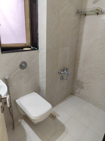 Bathroom in 1 BHK Apartment at Cosmos Orchid, Ghodbunder Road – for Rent