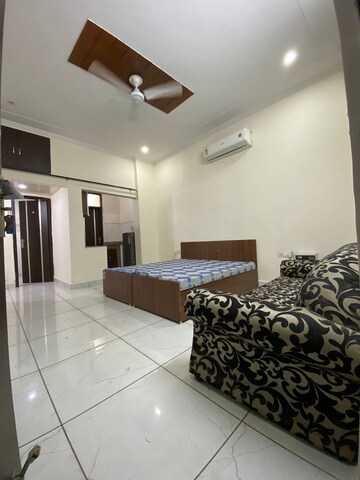 Bedroom in Studio Builder Floor at Ansal Sushant Lok I, Sector 43 – for Rent