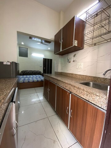Kitchen in Studio Builder Floor at Ansal Sushant Lok I, Sector 43 – for Rent