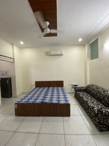 Bedroom in Studio Builder Floor at Ansal Sushant Lok I, Sector 43 – for Rent