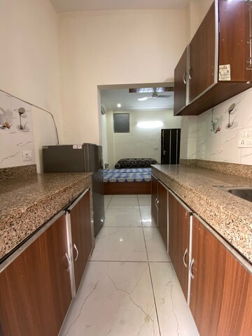 Kitchen in Studio Builder Floor at Ansal Sushant Lok I, Sector 43 – for Rent