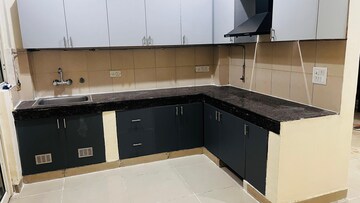 Kitchen in 2 BHK Apartment at Panchsheel Greens, Sector 16 Greater Noida – for Rent