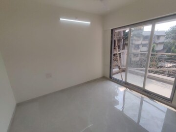 Room in 1 BHK Apartment at Tharwani Vedant Nakshatra, Badlapur West – for Sale