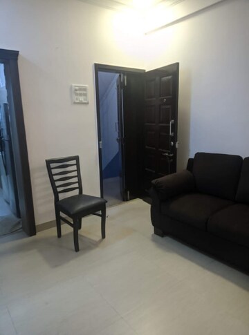 Living Room in 1.5 BHK Apartment at Bandra West – for Rent