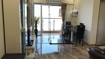 Living Room in 1 BHK Apartment at Lotus Lotus Link Square, Malad West – for Rent