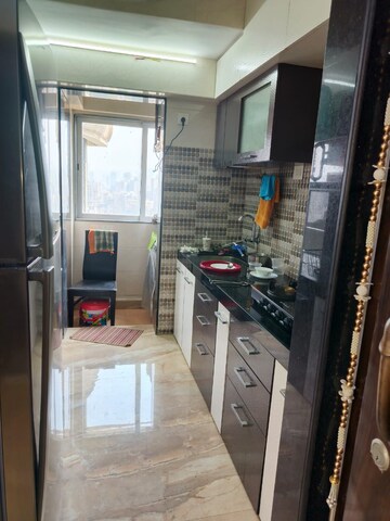 Kitchen in 1 BHK Apartment at Lotus Lotus Link Square, Malad West – for Rent