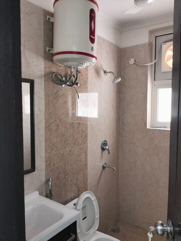 Bathroom in 3 BHK Builder Floor at Ansal API Esencia, Sector 67 – for Sale