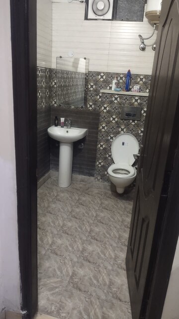 Bathroom in 3 BHK Builder Floor at Chahak Plaza, Shakti Khand – for Rent