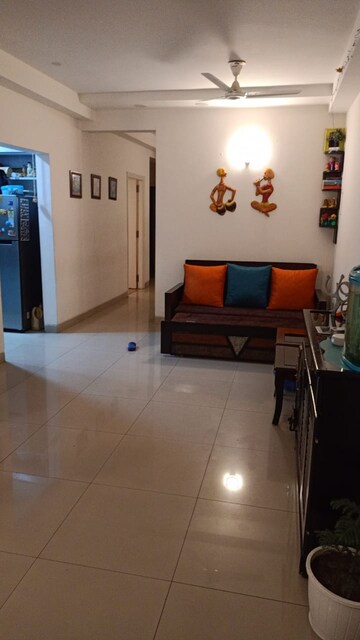 Living Room in 3 BHK Apartment at Emaar Palm Gardens, Sector 83 – for Sale