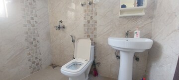 Bathroom in 2 BHK Apartment at Aims Golf Avenue I, Sector 75 – for Rent